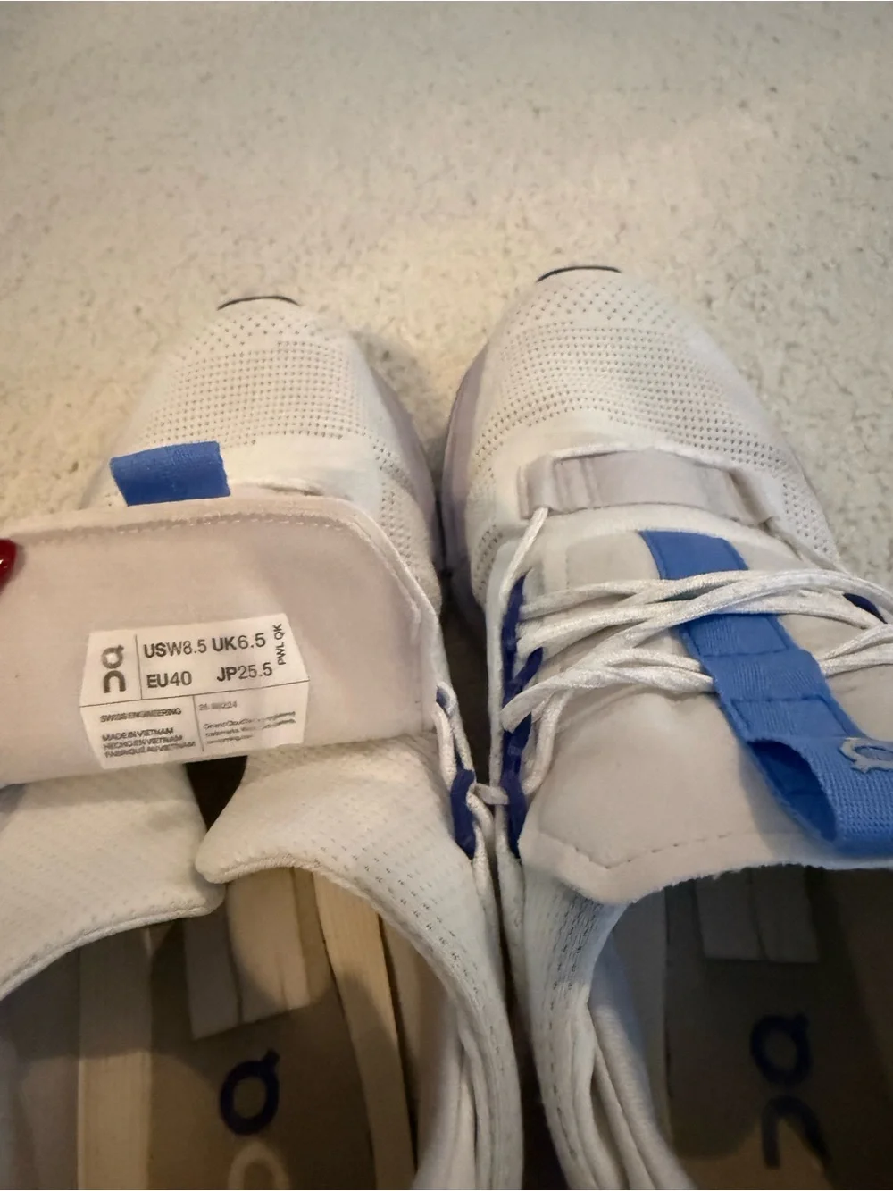 On Running Cloud Women’s Running Shoes in White and Light Blue